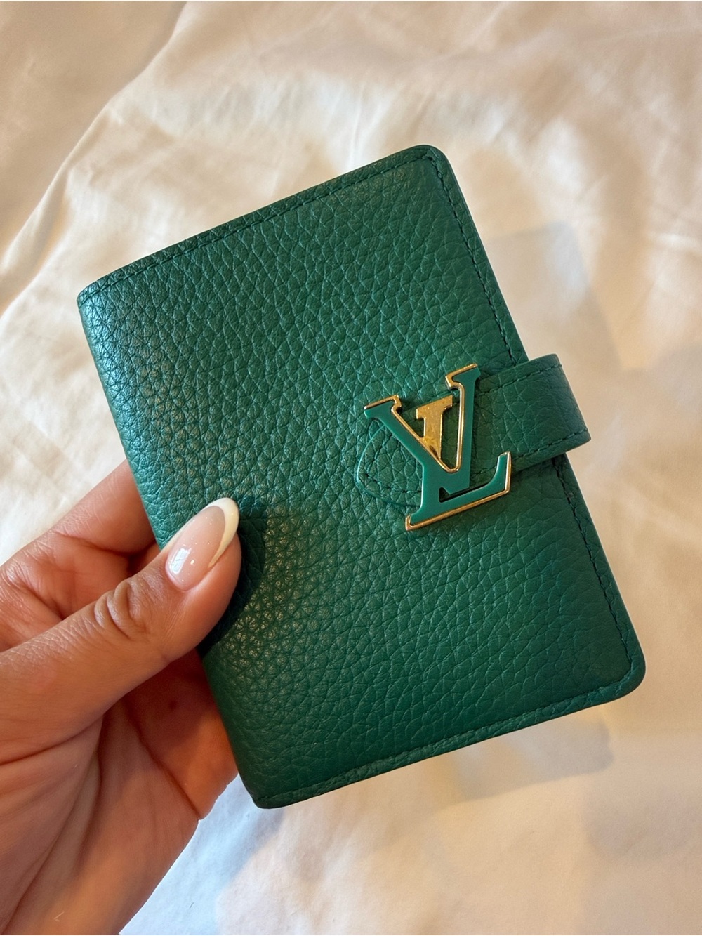 Louis Vuitton Capucines vertical compact wallet in emerald green